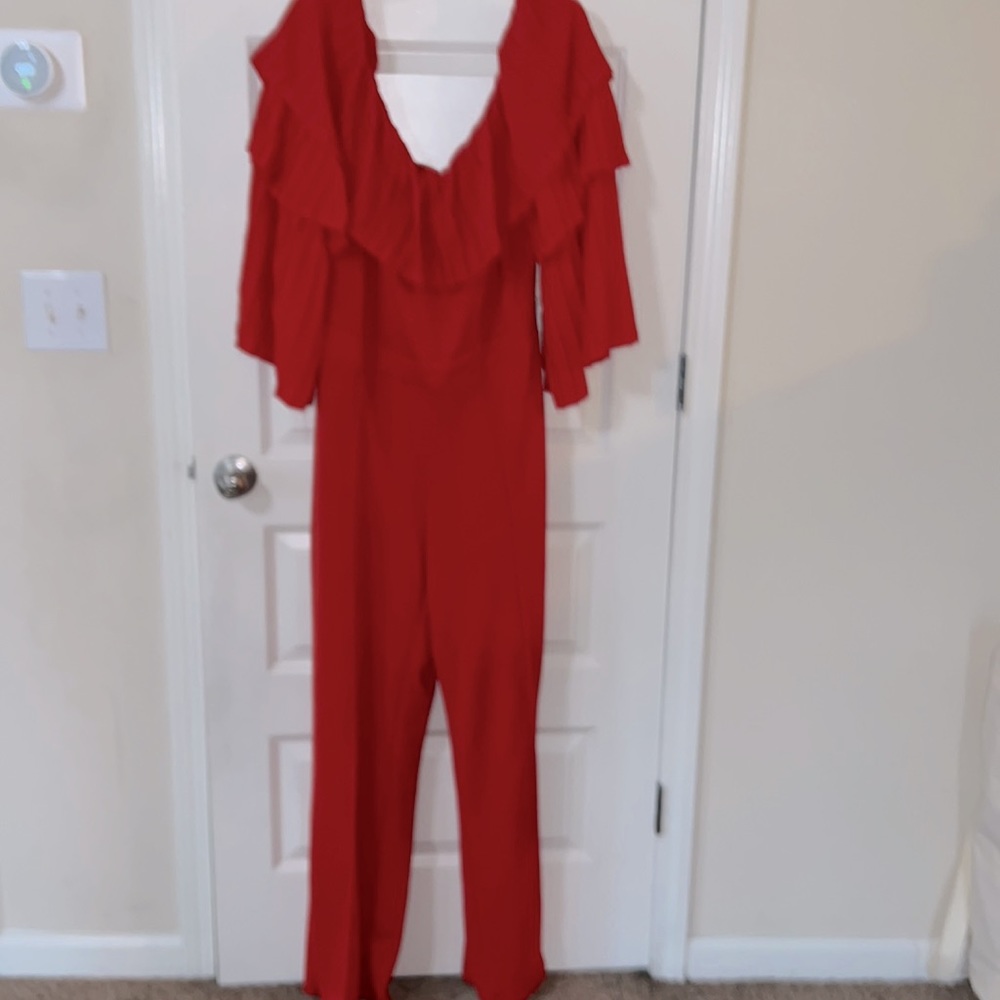 Red off shoulder w/ruffle detail zip back jumpsuit from Ashley Stewart sz22